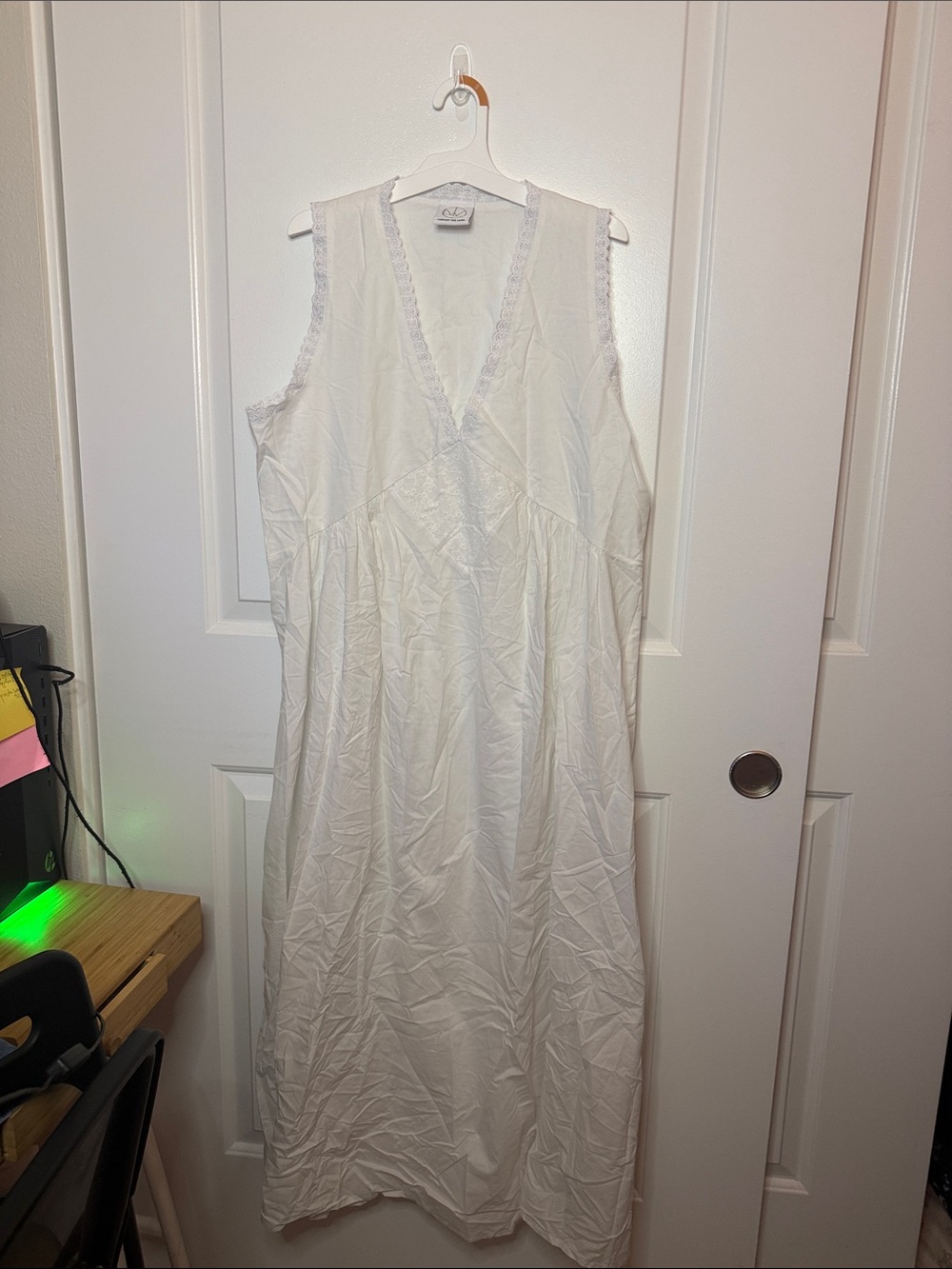 Sleeveless White V-Neck Maxi Dress with Lace Trim